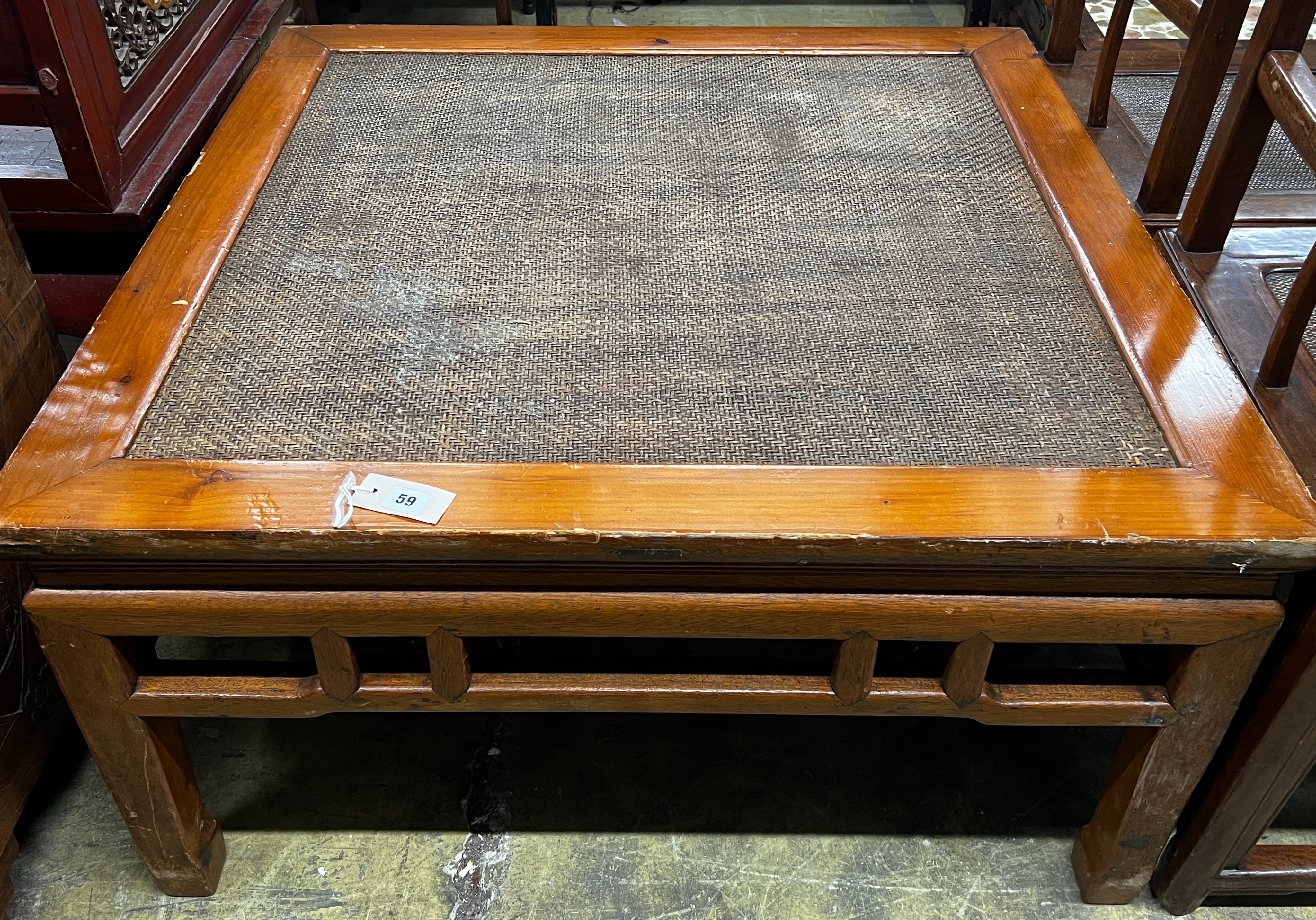 A Chinese square caned pine low table, width 97cm, height 51cm